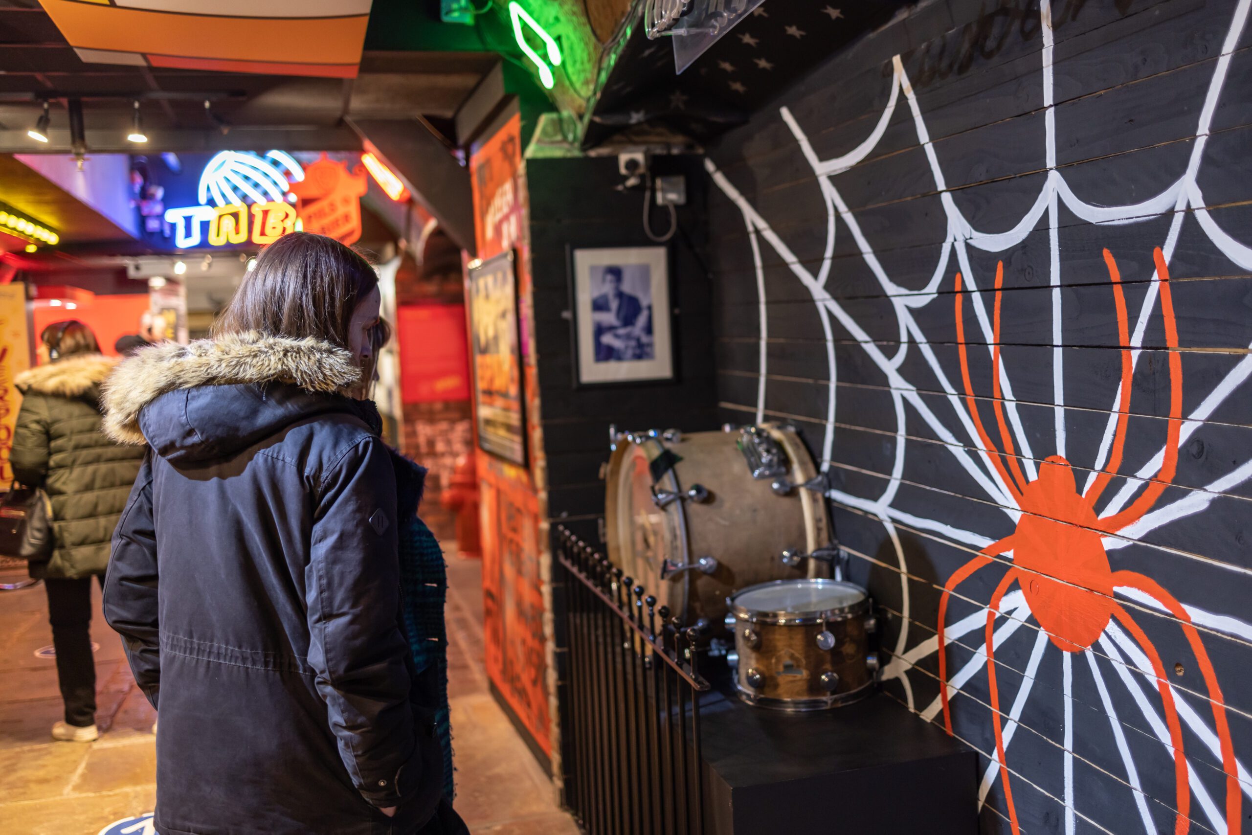 Visitors in the Casbah replica room at The Beatles Story Museum in Liverpool