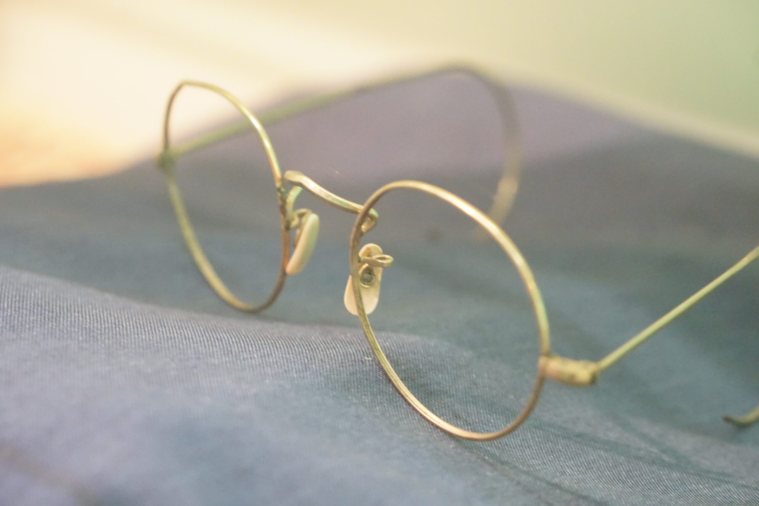 John Lennon's sunglasses on display at The Beatles Story Museum. The lenses were removed after Lennon's death as a show of respect.