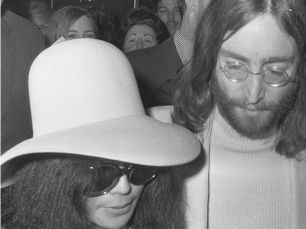 John Lennon and wife Yoko Ono leave the Hilton Hotel in Amsterdam, March 31, 1969.